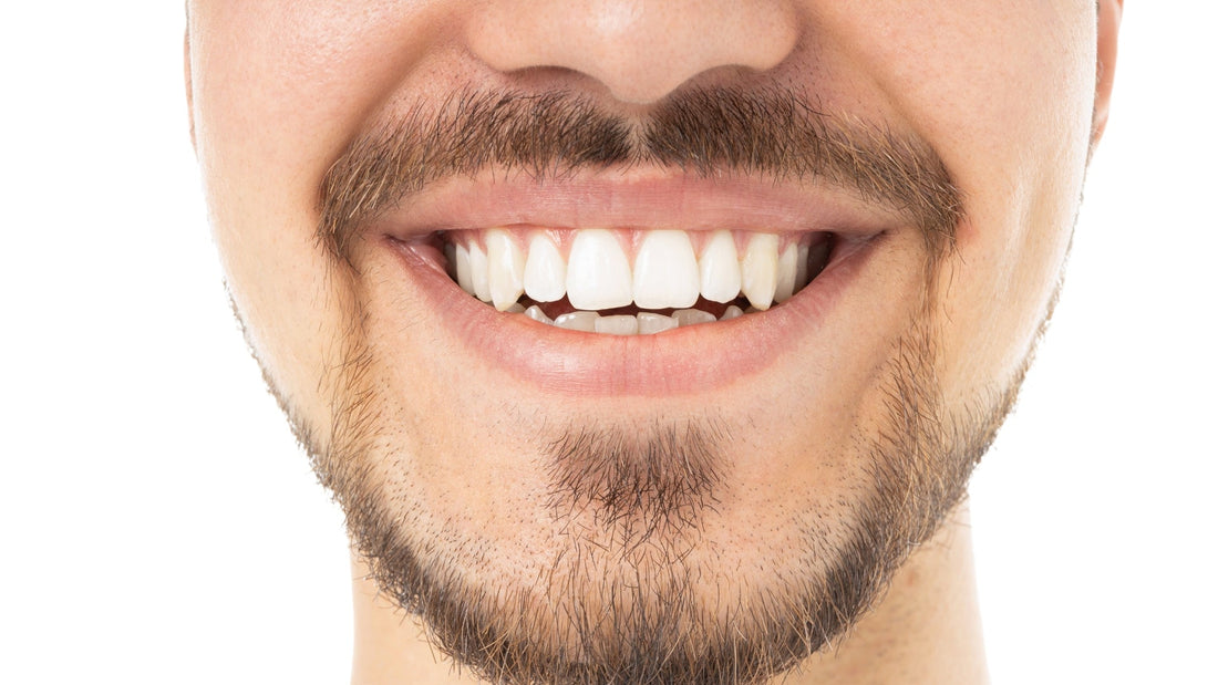 man smiling with white healthy teeth